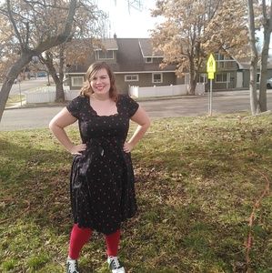 Vintage style dress with lady bugson it